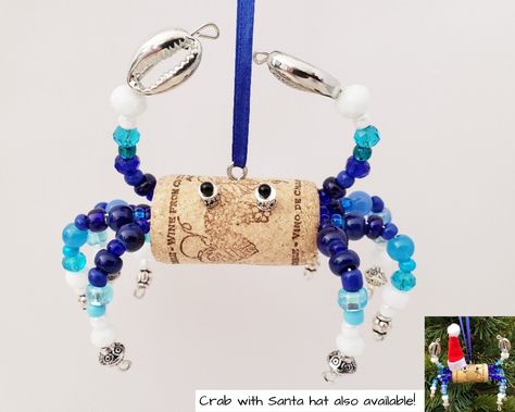 "Wine cork crab ornament is an ocean lover's best friend for so many occasions!  He would love to sit on your nautical themed tiered tray or coffee table, be a table ornament at a beach wedding, or hang out upon a beachy bathroom shelf.  He'd be a great friend keeping you company on your office desk and would impress your friends hanging in your home bar. He also loves being a beach house housewarming gift or a hostess thank you present.  The Santa hat version of wine cork crab will look so ador Cute Table Decorations, Fisherman Boat, Crab Ornament, Beachy Bathroom, Wine Cork Ornaments, Coastal Christmas Tree, Wine Cork Diy, Cute Table, Cork Ornaments