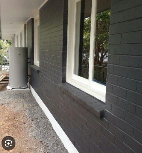 Dark Grey And Brick House Exterior, Black Brick House White Windows, Charcoal Gray Brick House Exterior, Black And Grey Brick House, Black Brick House White Trim, Paint Brick Black Exterior, Dark Painted Brick House Exterior, Dark Grey Painted Brick House, Dark Gray Painted Brick Exterior