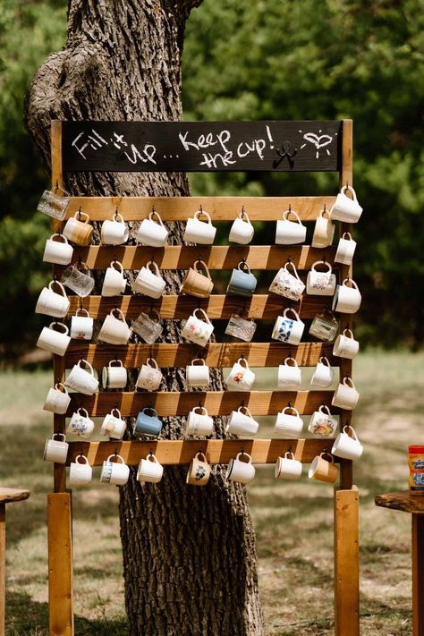 Thrifted mugs make a fabulous, eco-friendly favor. | Elm Pass Woods - Wedding Festivals Center Point, TX Laid Back Fall Wedding, Fairytale Woods Wedding, Wedding Fun Things, Eco Friendly Backdrop, Woodsy Engagement Party, Wedding At A Brewery, Cheap Backyard Wedding Reception, Cheap Wedding Ideas On A Budget Diy, Thrifted Wedding Favors