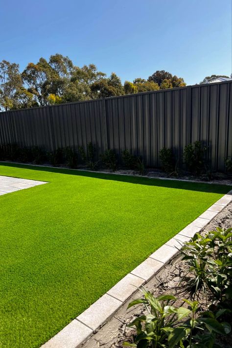 Create a low-maintenance backyard with artificial lawn! Perfect for backyard patio designs, Australian garden design, and small courtyard gardens, artificial grass offers a solution that looks beautiful all year round. Whether you’re transforming your outdoor entertaining area or creating a magical garden with fence landscaping or shade garden, artificial lawn adds greenery with no upkeep. Discover how this sustainable solution can elevate outdoor spaces!

#lowmaintenancegarden #courtyardgarden Small Grass Area Ideas, Garden With Fence, Artificial Grass Backyard, 2025 Vibes, Low Maintenance Backyard, Australian Garden Design, Plastic Grass, Small Courtyard, Courtyard Gardens