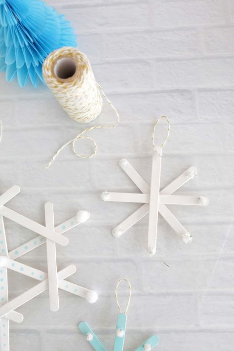 Popsicle Stick Snowflake - Childhood Magic Diy Kids Christmas Ornaments, Snowflakes For Kids, Popsicle Stick Snowflake Ornaments, Popsicle Stick Ornaments, Popsicle Stick Snowflake, Christmas Ornaments Diy Kids, Fun Winter Crafts, Handprint Ornaments, Snowflake Craft