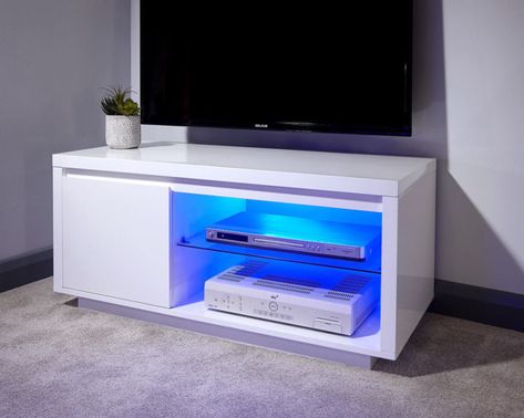 Get some best ideas to arrange LED light for TV unit with the help of The Architecture Designs. Visit our website for more inspirational ideas. #thearchitecturedesigns #tvunits #lightingdesign #lightdecor #lightingdecor #housedecor High Gloss Furniture, Led Tv Stand, Led Lighting Bedroom, Battery Operated Led Lights, Entertainment Units, Tv Entertainment Units, White Tv, High Gloss Paint, Small Sideboard