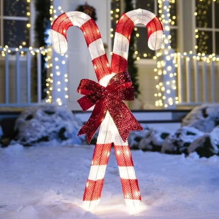 #Outdoor Christmas decoration# Candy Cane Pathway Lights, Candy Cane Lights Outdoor Ideas, Outside Candy Cane Decorations, Simple Christmas Lights Outside, Candy Cane Front Yard Decor, Candy Cane Christmas Outdoor Decorations, Traditional Outdoor Christmas Lights, Long Driveway Christmas Decor, Outdoor Christmas Decorations For Fence