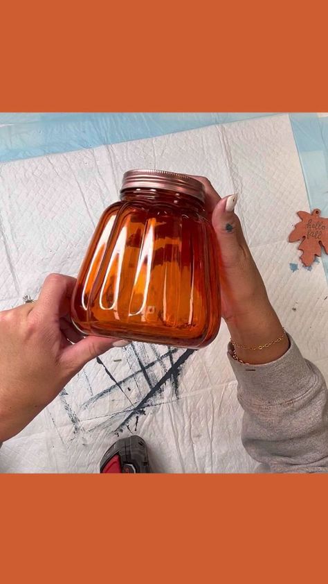 Glass Jar Fall Decor, Pumpkin Jar Decor, Glass Jar Pumpkins, Glass Pumpkin Jar Ideas, Glass Pumpkin Jar, Dollar Tree Pumpkin Shaped Glass Jar, Candy Corn Apothecary Jars, Chalk It Up Fancy, Dollar Tree Pumpkins