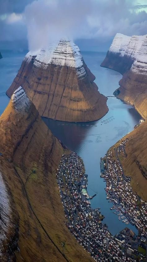 luigichiurchi on Instagram: •Who would live in this city?😵🌍.*• Klaksvík, located up in the north of the Faroe Islands, is a city started by combining small towns in… The Faroe Islands, Cliff City, Faroe Island, Faroe Islands Denmark, Island Town, Small City, Adventure Aesthetic, Island City, Fun Places To Go