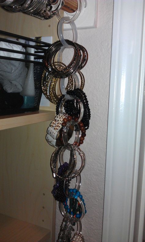 I used shower curtain rings to organize my bracelets. Each one hangs on another from my closet rod so they are easy to unsnap & choose one to wear. Keeps those bangles together & can use for travel too! Diy Curtain Rings, Bracelet Organization, Mens Closet Organization, Apartment Closet Organization, White Cocoa, Diy Shower Curtain, Jewerly Organizer, Jewelry Storage Diy, Closet Curtains