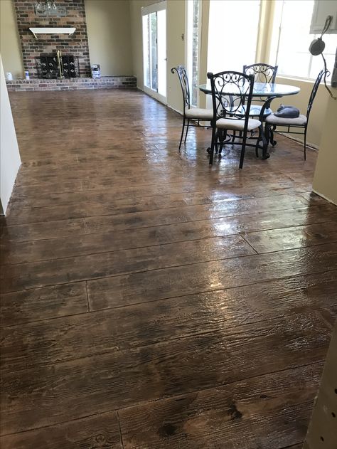 Stamped concrete wood floors! Stained Concrete Floors Wood Look, Stamped Interior Concrete Floors, Stamped Concrete Living Room Floor, Concrete Floors Look Like Wood, Wood Stamped Concrete Floors, Stamped Concrete Flooring, Faux Wood Concrete Floor, Concrete Stamped Floors, Stamped Concrete Basement Floor