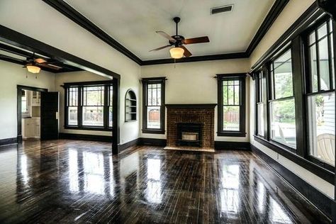 creamy walls, dark trim White Doors Black Trim Interior, Dark Brown Crown Molding, Black Interior Trim Moldings, White Wall Brown Trim, White Walls With Dark Wood Trim, White Walls With Brown Trim, Wood Trim On Walls, White Walls Brown Trim, Black Wall Trim