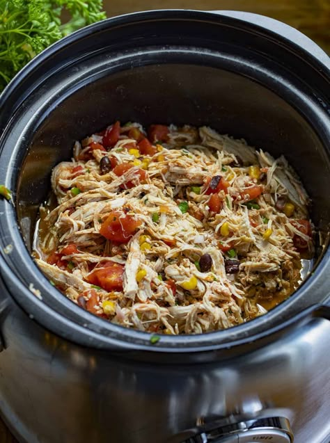 Crockpot Southwest Chicken is a versatile meal made with seasoned chicken breasts, black beans, sweet corn, pico de gallo, and diced tomatoes. Crockpot, Slow Cooker Recipes, Recipes, Southwest Chicken, Southwest Chicken Tacos, Southwest Chicken Bowl, Kids Meals, i am homesteader, iamhomesteader Southwest Chicken Crockpot, Crockpot Southwest Chicken, Chicken Breast Crock Pot, Braised Chicken Breast, Slow Cooker Turkey Chili, Crockpot Chicken Breast, Healthy Soups, Southwest Chicken, Pot Beef Stew