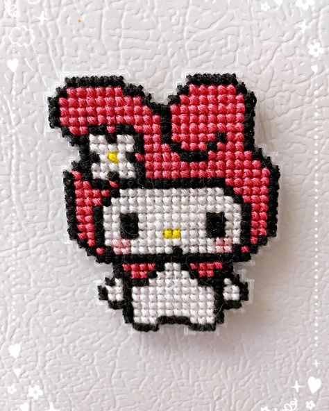 Sanrio Cross Stitch 🪡✨ I’ll probably be making more Sanrio themed magnets I need to expand my collection! . . . . . . . . . . . . . #sanrio #sanriocharacters #sanriothings #sanriostuff #cinnamoroll #mymelody #kuromi #tuxedosam #keroppi #gudetama #hellokitty #pompompurin #hellokittyandfriends #cutestuff #crossstitching #crossstitch #crossstitcher #handmadebyme #sanriolover #hellokittylovers Sanrio Cross Stitch Pattern, Kuromi Cross Stitch, Sanrio Cross Stitch, Stitch Flowers, Halloween Bags, Plastic Canvas Crafts, Canvas Crafts, Perler Bead Patterns, Cross Stitch Flowers