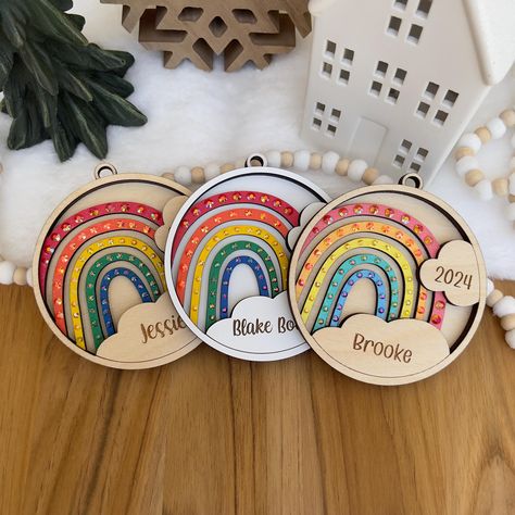 Personalized rainbow ornament, handmade with rhinestone embellishments, Custom rainbow baby gift, Baby's First Christmas ornament, by IndigoPeachDesigns on Etsy Rainbow Ornaments, Rainbow Baby Gift, Unique Stocking Stuffers, Baby's First Christmas Ornament, Baby First Christmas Ornament, Rhinestone Embellishments, Christmas Celebration, Baby's First Christmas, First Christmas Ornament