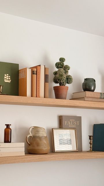 Books Floating Shelves, Styled Floating Shelves, Floating Shelves Bedroom Books, Thrifted Shelf Decor, Floating Shelves Above Couch, Shelf Above Couch, Uni Room Ideas Uk, Uni Room Ideas, Shelves Above Desk