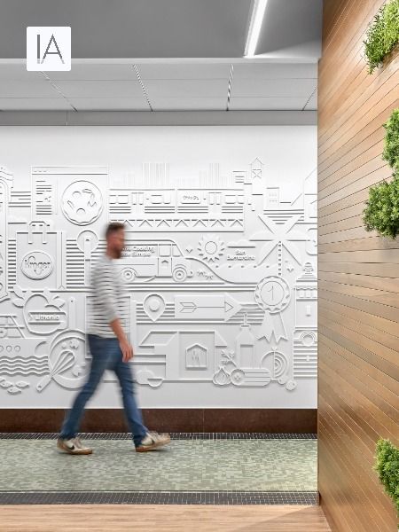 Raised white iconography behind a wooden wall help to tell the story of the Home Chef brand Office Graphic Wall, Environmental Graphic Design Wall, Office Branding Wall, Office Design Concepts, Experiential Graphics, Office Wall Graphics, Brand Wall, Experiential Graphic Design, Office Graphics