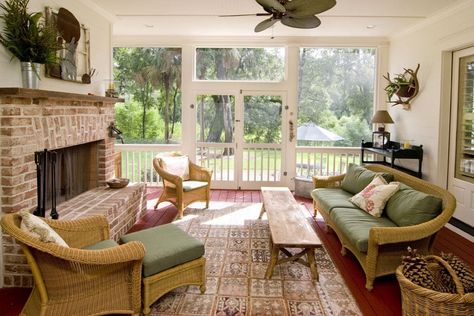 Cozy sunroom with brick fireplace and wicker furniture Indoor Sunroom Furniture, Sunroom With Fireplace, Indoor Sunroom, Sun Crown, Small Sunroom, White Wall Paint, Interior Brick, 4 Season Room, Sunroom Furniture