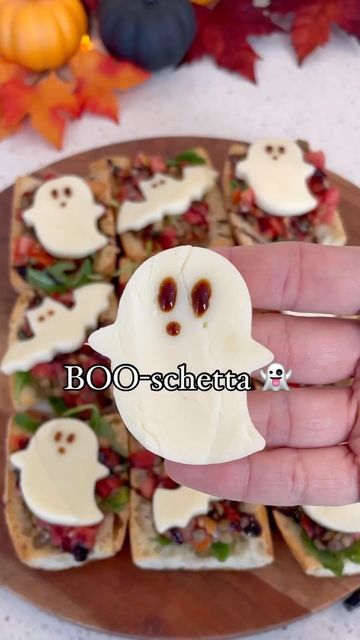 @thefeedfeed on Instagram: "@thesnowyblonde’s BOO-schetta is an easy appetizer recipe that is perfect for holiday parties 👻🎃

Get the details below and keep tagging #feedfeed for a chance to be featured.

HOW TO:
1. Slice french bread into 3-inch slices. Slice in half again.
2. Arrange on a baking sheet. Scoop out some of the bread if desired, and brush the top of the bread with olive oil.
3. Bake at 450F for 7 minutes.
4. Meanwhile, in a bowl mix together a container of Trader Joes bruschetta sauce and a bag of steamed lentils. Set aside.
5. Using halloween themed cookie cutters, slice mozzarella into spooky shapes.
6. Top the bread slices with arugula, the bruschetta mixture, balsamic glaze, and mozzarella cheese. 
7. Optional: use additional balsamic glaze to draw faces onto the chees Spooky Bruschetta, Ghost Bruschetta, Boo Schetta, Bruschetta Sauce, Steamed Lentils, Bread With Olive Oil, Draw Faces, Halloween Snacks, Balsamic Glaze