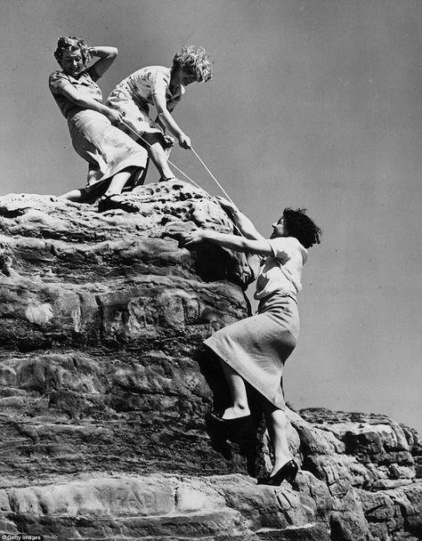 Holidaymakers in 1938 on a trip to Hastings, East Sussex, enjoy rock-climbing in attire more suited to the office Rock Climbing Women, British Holidays, Hastings East Sussex, A Level Photography, Rock Climbers, 100 Years Ago, Vintage Rock, East Sussex, Great British