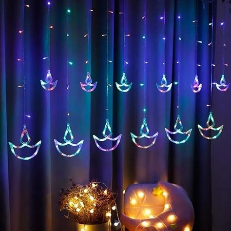 Buy Ziskle 12 Diya 138 LED Curtain String Lights Window Curtain Lights with 8 Flashing Modes Decoration for Christmas, Wedding, Party, Home, Patio Lawn Multicolor (138 LED-Star) Online at Low Prices in India - Amazon.in Light Diwali, Window Garland, Tree Indoor, Led Curtain Lights, Diwali Lights, Purple Tree, Led Curtain, Diwali Diya, Curtain String Lights