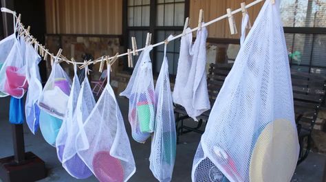 9 Ways You Aren't Using Mesh Laundry Bags, But Should Be Laundry Bags Diy, Dryer Lint Trap, Diaper Station, House Elves, Collapsible Laundry Basket, Machine Photo, Old Towels, Laundry Bags, Diy Laundry