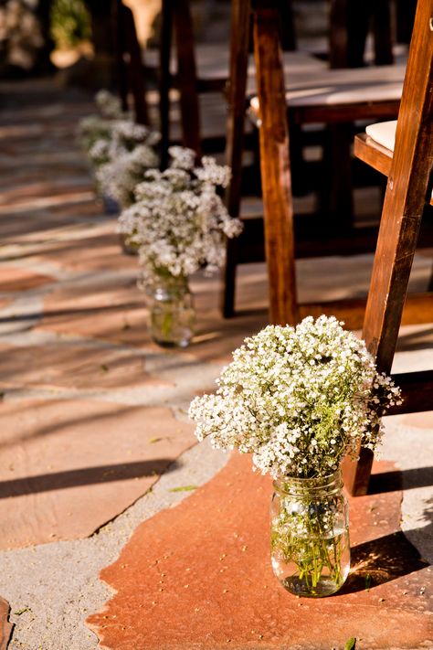 Mason Jar Isle Decorations, Outdoor Ceremony Simple Decor, Mason Jar Ceremony Aisle, Baby Breath Down The Aisle, Mason Jar Aisle Wedding, Baby’s Breath Aisle Decor, Mason Jar Aisle Decor, Simple Outside Ceremony Decor, Simple Outdoor Aisle Decor