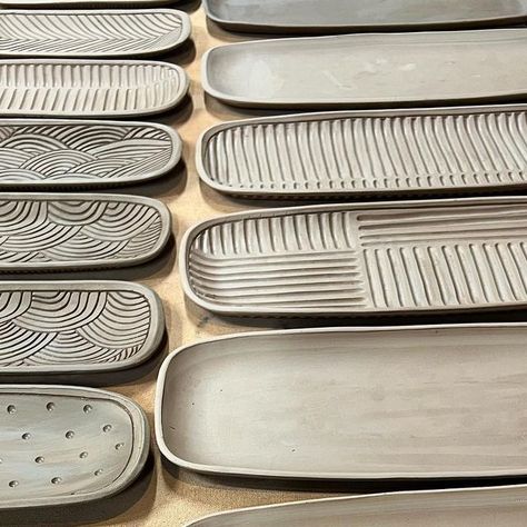 Gretchen Quinn Pottery on Instagram: "If there’s a flat spot in this studio, there’s a tray drying on it! The great stock up for fall/winter shows has begun. ✨ . . . #wip #servingtray #handmadetableware #tableware #carvedpottery #carvedclay #mixandmatch #functionalpottery #raleighmakers #raleighnc #studiopotter #ncpottery #madeinthesouth #madeinraleigh #handmadewithlove #clay #ceramics #pottery #modernmaker #gretchenquinnpottery #gretchenquinn" Flat Ceramics, Pottery Tray Ideas, Platter Ceramic Ideas, Clay Sushi Plate Diy, Pottery Platters, Ceramic Tray Ideas, Ceramic Trays, Ceramic Charcuterie Board Ideas, Hand Built Platter