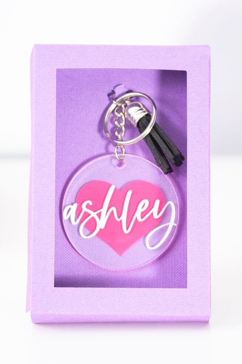 Acrylic keychain with vinyl heart background and vinyl name on front. Keychain With Tassel, Name Keychain, Heart Background, Acrylic Keychain, Personalized Keychain, Keychain Gift, Clear Acrylic, Custom Name, Keychains