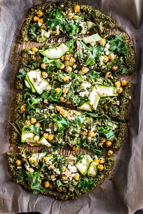 Green Pizza | A super fresh take on pizza made with a broccoli oat crust, a zingy herby green sauce, and topped with zucchini ribbons, chickpeas, crunchy kale and feta.  | The Crooked Carrot Scrappy Recipes, Broccoli Crust Pizza, Crunchy Kale, Kale Pizza, Oat Crust, Microgreens Recipe, Green Pizza, Broccoli Stalk, Healthy Pizza Recipes