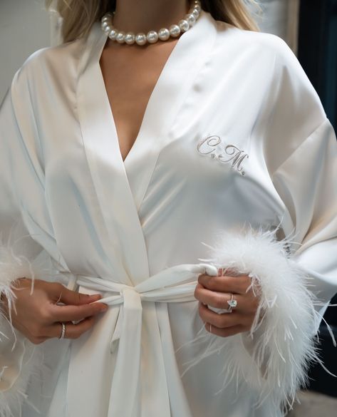 Before the aisle, there's the getting ready in style. Experience pre-wedding perfection with our dedicated Kimono collection for brides, designed with love by Le Olive. It is also possible to have this kimono personalised with the bride's (future) name. ⁠ ⁠ #bride #bridebook #bridestyle #bride2be #brideinspiration #personalised #personalisedgifts #personalisedgift #personalisedkeepsakes #kimono #feather Bride Robe Getting Ready, Kimono Bride, Kimono Collection, Boho Wedding Backdrop, Angelcore Aesthetic, Bride Preparation, Catholic Beliefs, Bridal Nightgown, Bridal Gown Styles