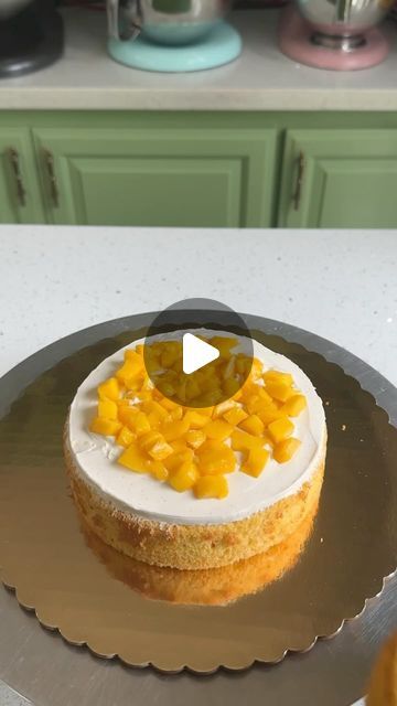 Ankita Dutta Dubey | CAKE ARTIST on Instagram: "Mango cake assembly!   Now that mango season is almost over, I am going to really miss this because it my favorite flavor on the menu ☺️  Assembling my most loved mango chiffon. The cake does require gentle soaking. After the crumbcoat, I refrigerated the cake for about 30 minutes before I put on the second coat.   I’ve paired the cake with vanilla Swiss meringue buttercream and fresh mango.   #mangocake #mangocakes #mangodessert #chiffoncake #chiffoncakes #cakereels #cakereel #cakereelsofinstagram #cakedecorating #cakeflavours #cakesgram #cakeinspiration #cakeinstagram #naanbaibakes #naanbaicakes #naanbai." Mango Cake Filling, Cake Assembly, Mango Dessert, Mango Cake, Cake Artist, Meringue Buttercream, Swiss Meringue Buttercream, Swiss Meringue, Mango Tops