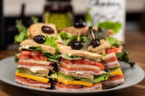 The Dagwood Sandwich - Powered by @ultimaterecipe Dagwood Sandwich Recipes, Dagwood Sandwich, Bacon Crisps, Red Leaf Lettuce, Sliced Salami, Deli Meats, Deli Ham, Culinary Travel, Piece Of Bread