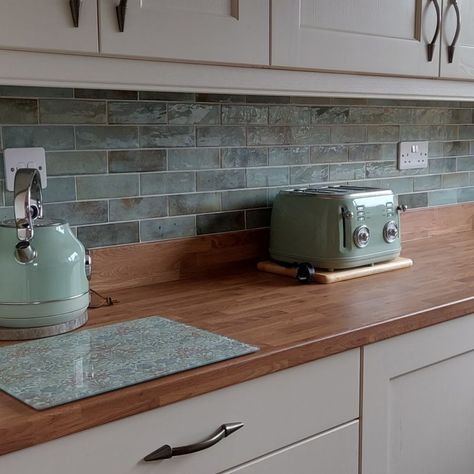 Colour co-ordination is on point! Our Cabana light green tiles create the perfect feature wall for your kitchen or bathroom 💚 #GreenTiles #WallTiles #NewTiles Green Wall Tiles Kitchen, Coloured Kitchen Tiles, Coloured Tiles Kitchen, Azulejos Kitchen, Kitchen With Green Tiles, Green Tiled Kitchen, Kitchen Green Tiles, Green Tiles Kitchen, Coloured Tiles