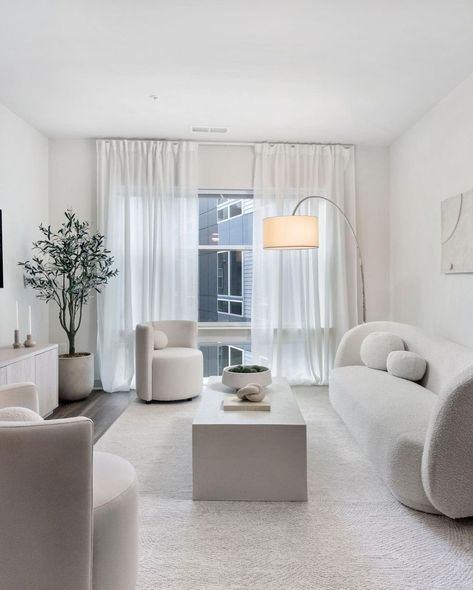 Rove Concepts Furniture on Instagram: “Calm and soothing space featuring the soft silhouettes of the #DianeSofa and #NovaLoungeChair. #RefinedLuxuryLiving ⁠ ⁠ Photo by…” Rove Concepts Living Room, Modern Coffee Table Decor, White Coffee Tables, White Sofa Living Room, White Coffee Table, Elegant Living Room Decor, Luxury Bedroom Decor, Rove Concepts, Apartment Makeover