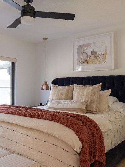 cozy guest bedroom with channeled velvet headboard Original Brick Fireplace, Black Trim Windows, White Lime Wash, Cozy Guest Bedroom, Trim Windows, White Oak Flooring, Floating Sink, Lime Wash, Velvet Headboard