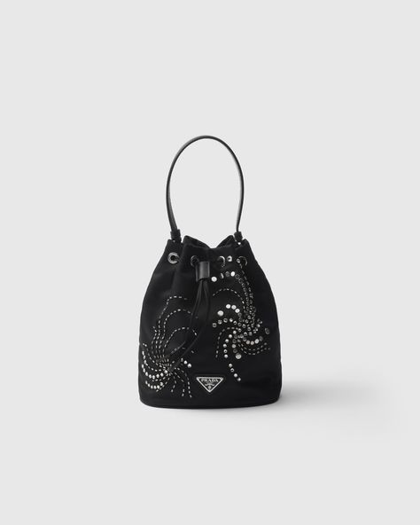 Black Re-nylon Embroidered Mini-bag | PRADA Prada Nylon Mini Bag, Crystal Embroidery, Travel Size Perfume, Prada Nylon, Mini Bucket Bags, Mini Bucket, Metal Straps, Triangle Logo, Leather Bucket Bag