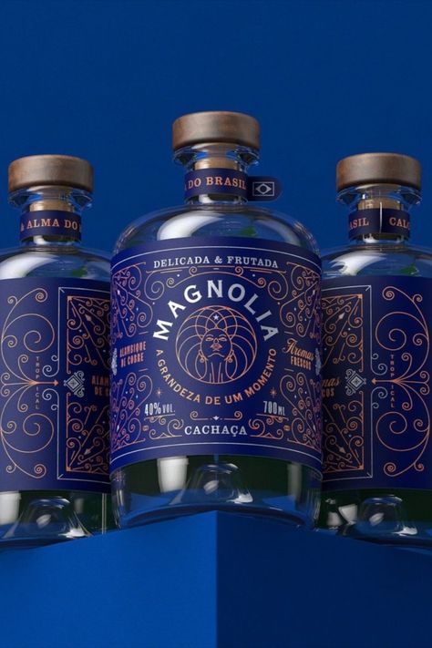 Marcelo Andrade's packaging design for Magnolia Cachaça showcases a rich and stunning dark blue label that effortlessly coordinates with the subtle brown and white details. Brazilian Culture, Alcohol Packaging, Packaging Designs, Creative Graphic Design, Blue Label, Graphic Design Studios, Creative Ads, Packaging Design Inspiration, Bottle Design