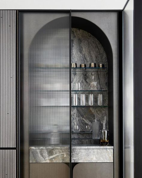 GRADE New York’s Instagram profile post: “Central to the design and functionality of the dining room at our Tribeca Family Residence is the Arch Bar Cabinet. Opposite from the entry…” Black Travertine, Textured Glass Door, Arch Bar, Curved Cabinets, Coin Bar, Home Bar Cabinet, London Interior Design, Crockery Unit, Study Room Design