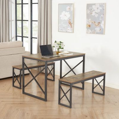 Whether you want to add a small entertaining corner for hosting friends and family, or you just need a cozy place to enjoy a quick breakfast in the morning, this furniture set is a must-have for your home. When not in use, the matching sturdy bench can be conveniently and neatly placed under the table. With versatility and a sleek industrial feel, this dining table set is the perfect piece to bring a modern, stylish vibe to your home. It can be used as a breakfast corner, bar table or even a desk for a variety of functions. While the bench design is especially suitable for a family of four, the stool can also be used as an item for outdoor gatherings. 17 Stories Size: 30" H x 27.6" L x 43.3" W, Colour: Brown/Black | 17 Stories Aithan 4 - Person Breakfast Nook Dining Set Brown 30.0 x 43.3 x Dinning Table Set, Breakfast Nook Dining Set, Nook Dining Set, Kitchen Table Set, Table And Bench Set, 3 Piece Dining Set, Dinette Tables, Wood Dining Room, Dinette Sets