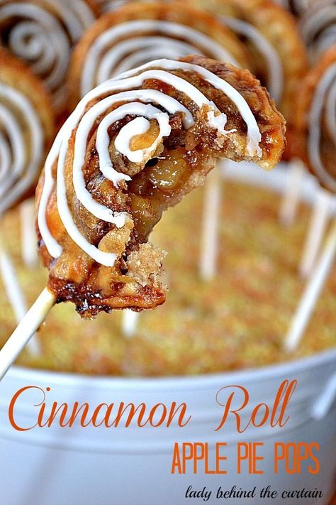 Cinnamon Roll Apple Pie Pops - The outside is a cinnamon roll and in the side is a apple pie that you would swear has caramel in it.  These are so easy to make using Pillsbury’s ready made pie crust dough. Apple Pie On A Stick, Apple Pie Pops, Ready Made Pie Crust, Cinnamon Roll Apple Pie, Pie Crust Dough, Pie Pops, Tarte Fine, Dessert Recipies, Pie Shop