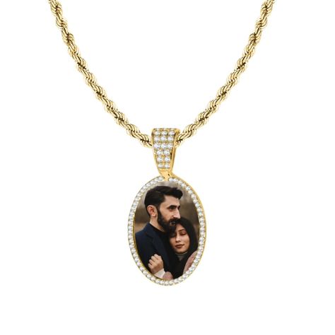 Elevate your keepsakes with our Iced Oval Photo Necklace. This custom piece features a beautiful oval-shaped pendant, adorned with shimmering cubic zirconia stones, encasing your favorite photo. A timeless way to keep your loved ones close and add a touch of sparkle to any outfit. Perfect for gifting or personalizing your collection with meaningful memories! #OvalPhotoNecklace #IcedNecklace #CustomJewelry #PersonalizedPendant #MemoryKeepsake #UniqueJewelry #BespokeGift #GiftOfLove #PhotoPend... Necklace With Picture Inside, Necklace With Picture, Portrait Jewelry, Arabic Jewelry, Memory Pictures, Medical Jewelry, Picture Necklace, Bangle Ring, Photo Necklace