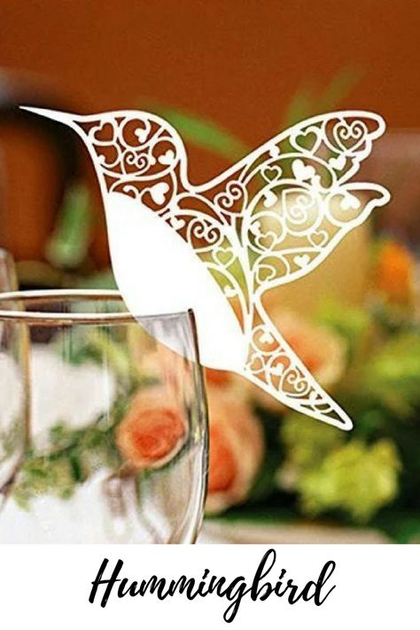 Pack of 50 Laser cut ivory Hummingbird Name Place Cards for Wine Glass. (Affiliated Link). #wedding #wedding stationary # table names # laser cut # Bride # wedding guests # wedding tables # Xmas Invitations, Table Number Place Cards, Place Card Table Wedding, Wedding Party Table Decorations, Custom Wine Glass, Wedding Table Names, Bird Wedding, Name Place Cards, Paper Place