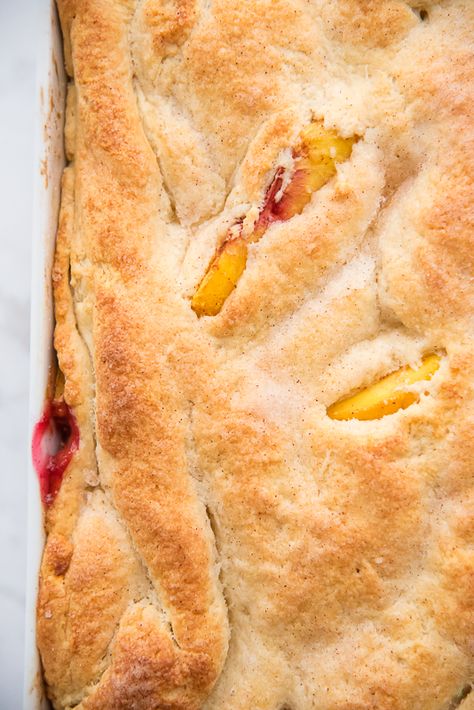 Old-Fashioned Peach Cobbler, with a flaky crust and spiced filling can't be beat. Make the most of peach season with this easy to make dessert. #peachcobbler #peaches #peachdessert #laminateddough #piedough #piecrust #cobbler #fruitcobbler #dessert #southerndessert #southern #fruit #peach #alamode #easytomake #kidfriendly #baking #pastries #bourbonpeach Peach Cobbler With Can Peaches, Fresh Peaches Cobbler, Peach Cobbler Crust Homemade, Peach Apple Cobbler Recipe, Crusty Peach Cobbler, Peach Cobbler With Biscuits Easy, Peach Cobbler Easy Canned Pie Fillings, Easy Peach Cobbler With Fresh Peaches, Fresh Peach Cobbler Easy Homemade