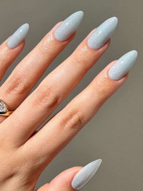 25 Stunning Blue Winter Nails to Inspire Your Next Manicure Icy Blue Manicure, Light Blue Pastel Nails, Frosty Nails Blue, Sparkle Light Blue Nails, Icy Blue Glitter Nails, Frost Nails Winter, Ice Blue And Silver Nails, Pale Blue Christmas Nails, January Vacation Nails