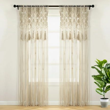 Welcome some relaxing elements of the bohemian style wherever you hang this stylish Boho Macrame Tassel Cotton Window Curtain. Detailed with large hanging tassels, this handcrafted panel is woven with 100% cotton. The versatility of this decorative curtain allows you to use this item as a window or doorway curtain, room divider, photo backdrop or as wall art. Macrame home decor is always on trend. The unique design and texture of this Boho Macrame Tassel Cotton Window Curtain make it easy to see Macrame Tassel, Curtain Room Divider, Hanging Tassels, Neutral Curtains, Macrame Home Decor, Doorway Curtain, Tassel Curtains, Curtain Room, Lush Decor