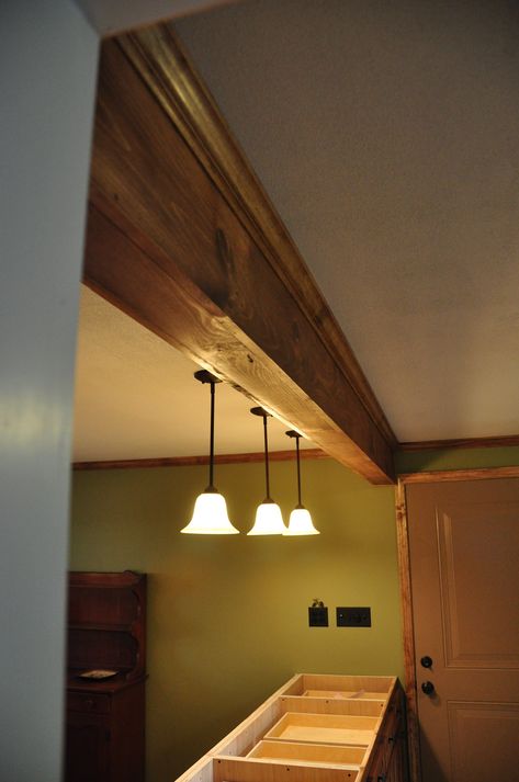 Pine-wrapped LVL Beam w/ Pine Crown Molding | Steve Erwin | Flickr Stained Crown Molding Wood Trim, Rustic Crown Molding, Steve Erwin, Lvl Beam, Wood Crown Molding, Wood Beams, Crown Molding, Summer House, Beams