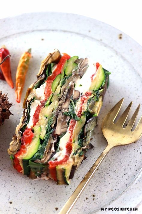 My PCOS Kitchen - Roasted Vegetable Terrine - A vegetable terrine on a white ceramic plate beside a gold bronze spoon. Vegetable Terrine, Terrine Recipe, Chimichurri Sauce Recipe, Roasted Vegetable, Eggplant Recipes, Grilled Vegetables, Veggie Dishes, Chatelaine, Ceramic Plate