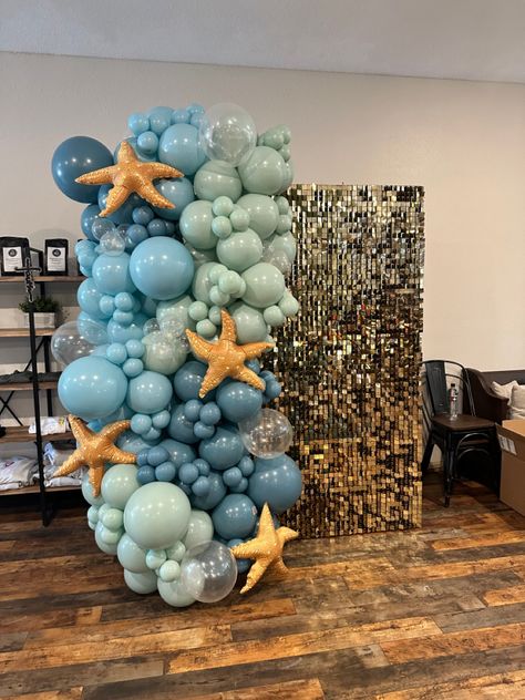 Blue Sequin Backdrop, Beach Theme Balloon Decor, Under The Sea Prom Ideas, Beachy Balloon Arch, Beach Theme Sweet 16 Ideas, Ocean Theme Balloon Garland, Underwater Theme Decor, Ocean Theme Balloon Arch, Under The Sea Formal Theme