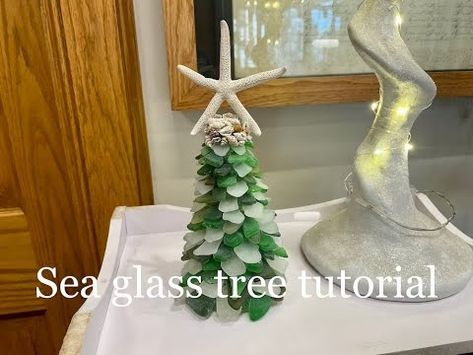 How to make a Christmas tree out of sea glass - YouTube How To Make A Sea Glass Christmas Tree, Diy Sea Glass Christmas Tree, Beach Christmas Decorations Diy, Sea Glass Christmas Tree Diy, Beachy Crafts, Broken Glass Crafts, Sea Glass Diy, Flat Christmas Tree, Sea Glass Christmas