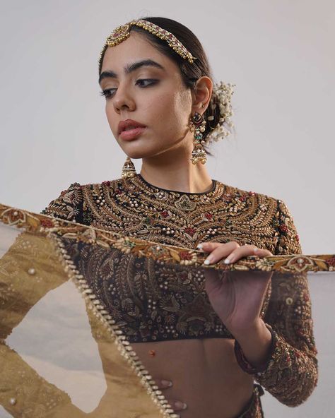 Lost in a world of forbidden luxury. This Noor-e-Mahal Lehenga Set is a masterpiece of intricate gold dabka, Zardozi and Kasab Dori embroidery, designed to tantalize and captivate. Every thread, every bead, is a secret invitation to embrace your inner siren. @_richaahluwalia introduces silhouettes drenched in the sparkles of precious embellishments for the new-age brides. Visit us at B-25, Defence Colony, New Delhi. To schedule an appointment or arrange a video call, please dial +91 8800880... Secret Invitation, Inner Siren, Dori Embroidery, Zardozi Embroidery, Video Call, Embroidery And Stitching, New Delhi, New Age, Lehenga