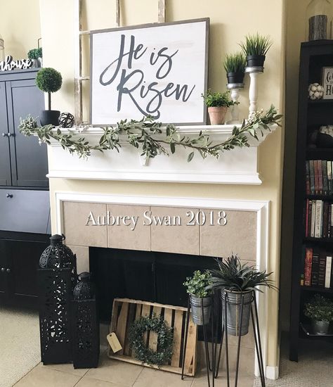 He Is Risen Farmhouse Mantle Fireplace Easter Decor Fireplace Easter Decor Mantle Ideas, Easter Decor Mantle, Fireplace Decor Ideas Farmhouse, Tv Mantel Decorating Ideas, Spring Fireplace Mantle Decor, Xmas Wall Decorations, He Is Risen Decor, Easter Fireplace Mantel Decor, Easter Fireplace Mantel