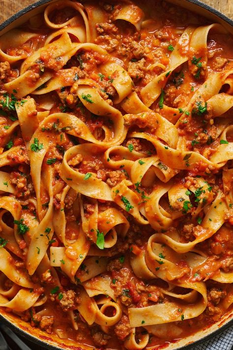 My favorite bolognese recipe is a rich tomato sauce made up of pancetta, ground beef, and Italian sausage. Use this meat sauce in your favorite lasagna, baked ziti, or stuffed shells recipe. Or use this versatile pasta sauce recipe on spaghetti, rigatoni, or tagliatelle. Delicious with a side of garlic knots and a simple salad. Ground Beef Bolognese Sauce, Meaty Pasta Recipes, Lasagna Bolognese Recipe, Easy Bolognese Sauce, Baked Ziti With Ground Beef, Green Bean Casserole Bacon, Best Bolognese Sauce, Pizza Sauces, Homemade Bolognese Sauce