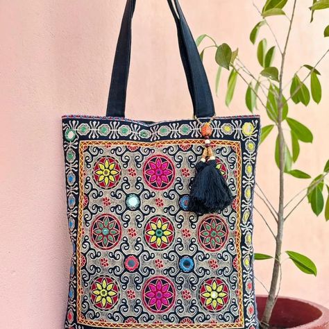 *New Ajrakh Handbag* Ajrakh stylish hand bag with hand embroidery and mirror work inside pockets Zip clouser Size: 15 x 16 inch Please Note- Shades may slightly vary due to lights/Flash/Resolution/Display Screens/Reflection/Camera Quality. #sandookcollection #handwork #handmade #handworkbags #ajrakh #entique #classylady #classyoutfit Mirror Work, Work Bags, Display Screen, Classy Women, Hand Bag, Classy Outfits, Inside Pocket, Hand Embroidery, Flash